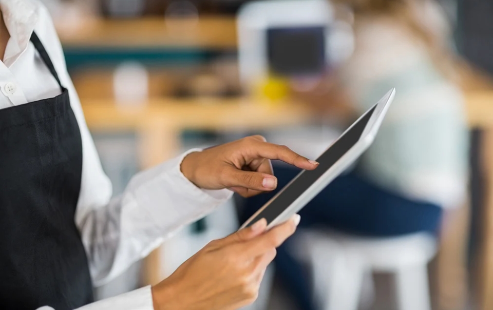 Woman using ipad.